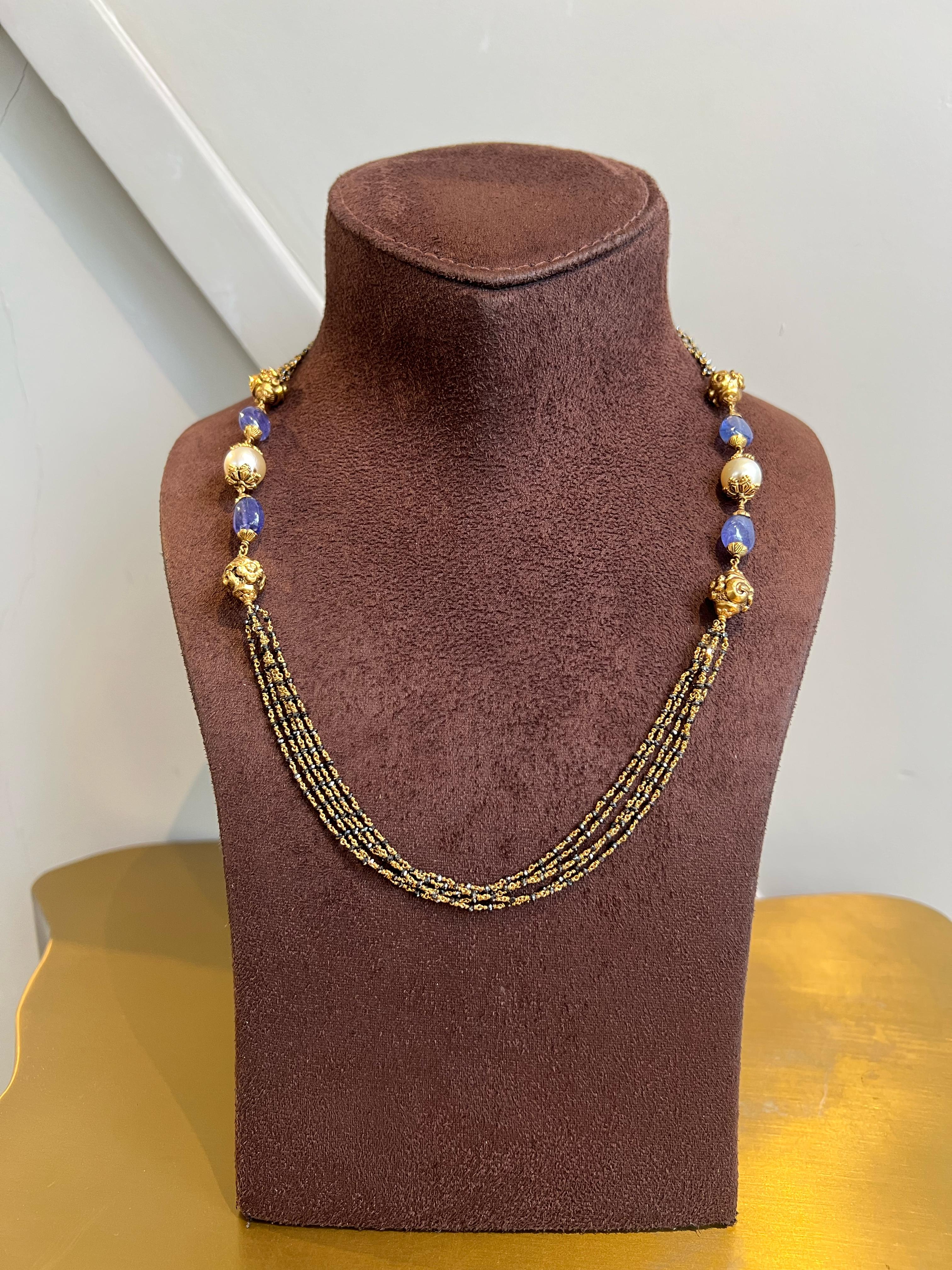 Black Diamond beads with Tanzanite, pearl and nakshi ball Black Diamond beads with Tanzanite, pearl and nakshi ball