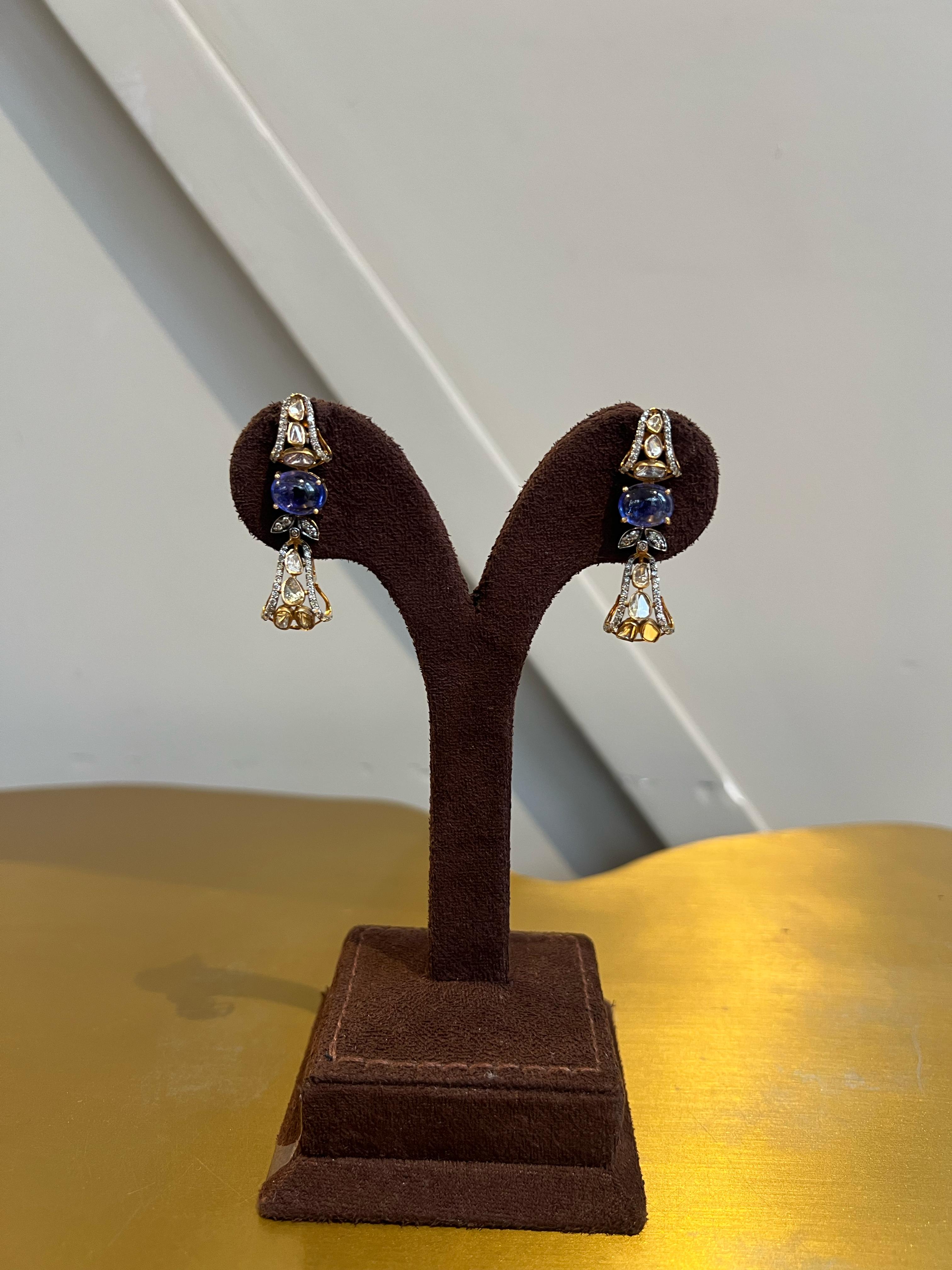Polki earrings studded with tanzanite Polki earrings studded with tanzanite
