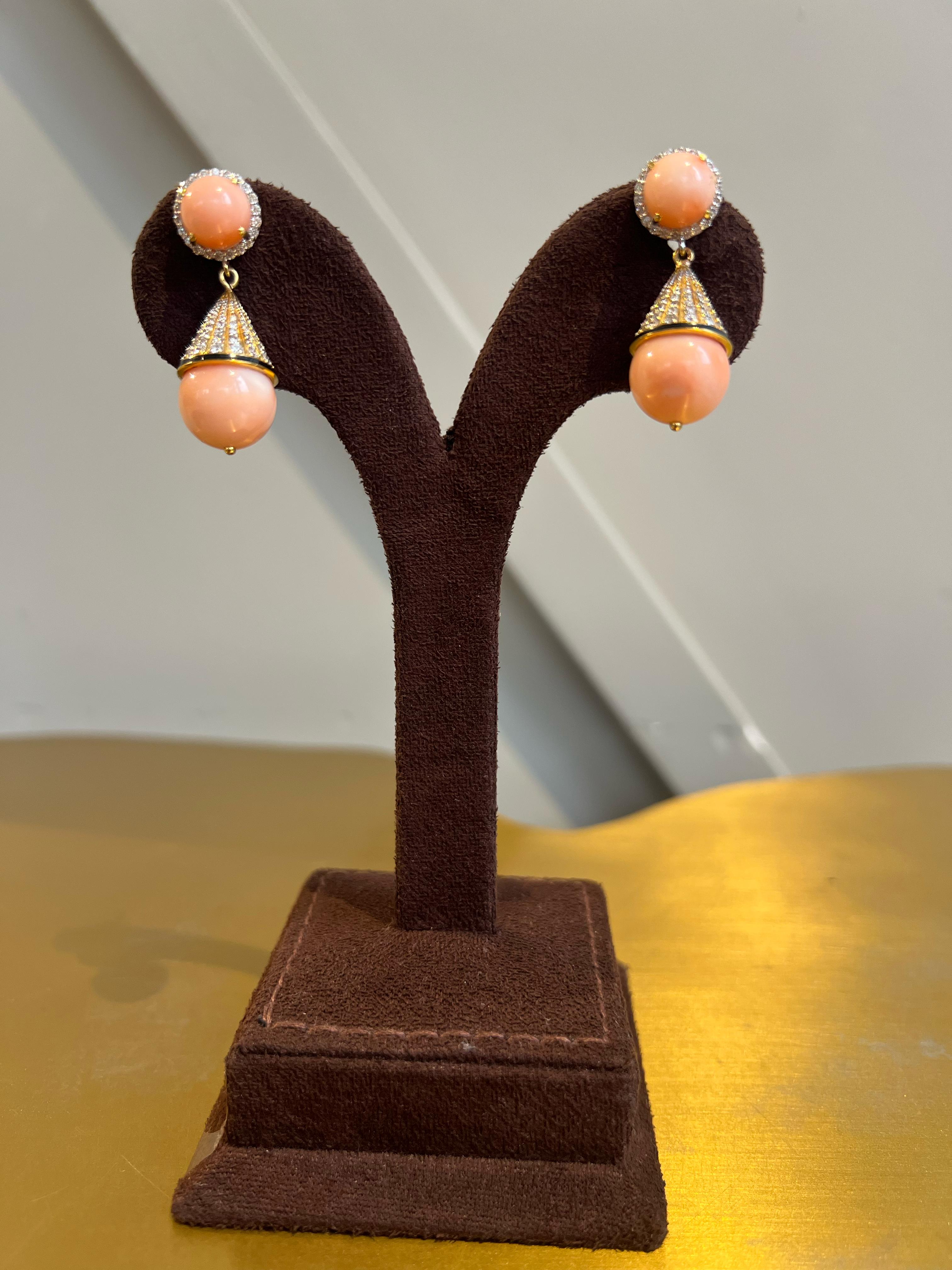 Stylish coral earrings studded with diamonds Stylish coral earrings studded with diamonds